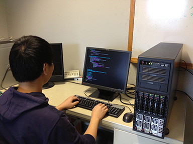 student working with computer system
